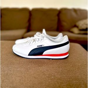 Size 12 PUMA Brand new never worn.